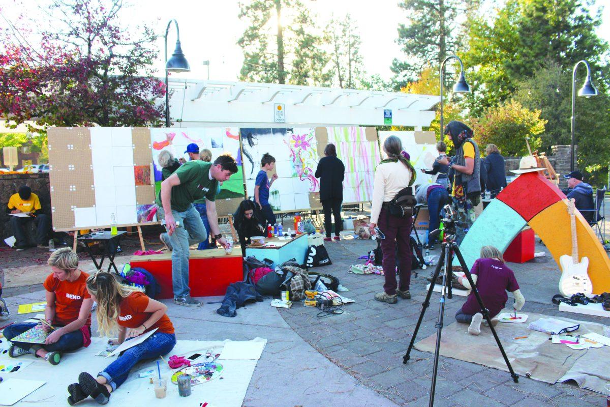 Members+of+the+Bend+community+gather+to+paint+near+Mirror+Pond%2C+Oct.+2%2C+during+Bends+annual+Fall+Festival