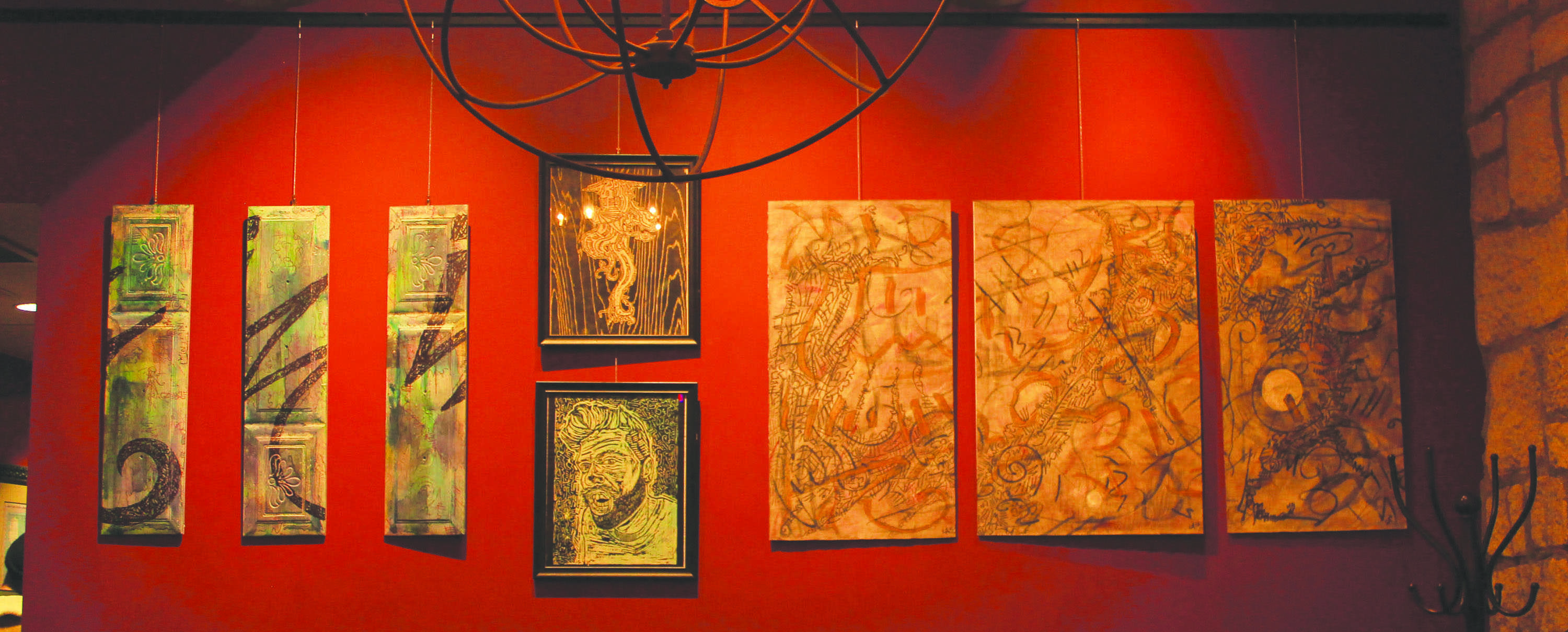 The sets of three paintings, tryptics, on the right and the left are Luck Allee's most recent works completed in the Fall Term of 2015 durig the OSU-Cascades Drawing Concepts course. The center pieces are prints carved by Luke Allee during the 2014-15 school year in another Drawing Concepts Course.