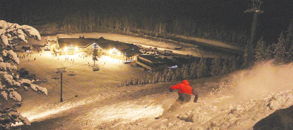 Max Ruhlen, an OSU-COCC Student, skis down hoodoo on Feb. 6 During a night session at the Hoodoo Ski Resort.