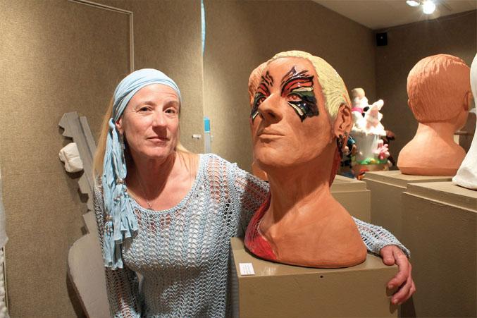 Sherry Woodyard, sculpture 1 student said that she chose to paint a butterfly mask on her sculpted head in remembrance of her friend Mel Nelson who recently passed and asked her to do an art piece on his instrumental song, "Rainbow."