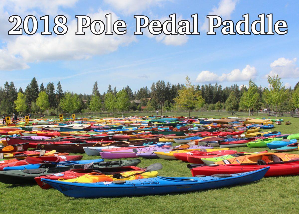 All the kayaks set up and ready to roll for the 2018 Pole Pedal Paddle. Saturday May 19, 2018 Bend, Oregon.