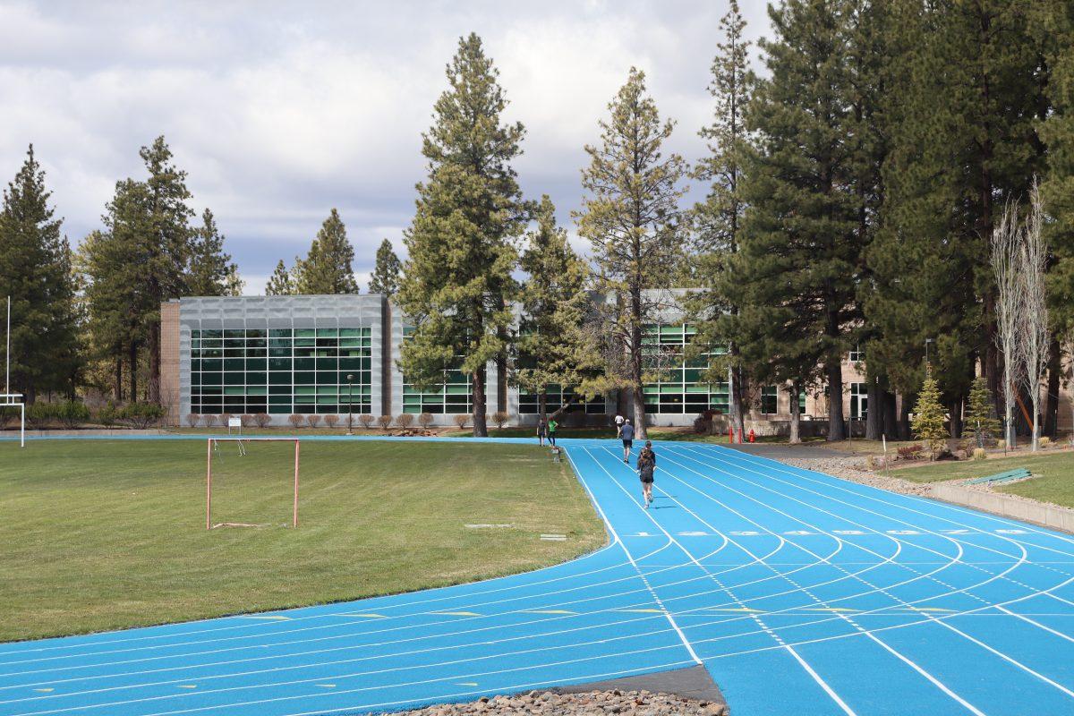 Central Oregon Community College students continue to use the COCC track though all facilities are closed, Thursday, April 16. Photo by Kayla Scott.
