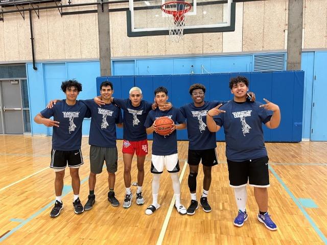 The defending league champions “The Grand Jury!” led by league MVP Jesse Sanchez (ball in hand) will try to maintain their place as champions under a new name: The Bucket Getters. (Photo from Randal Seaton)