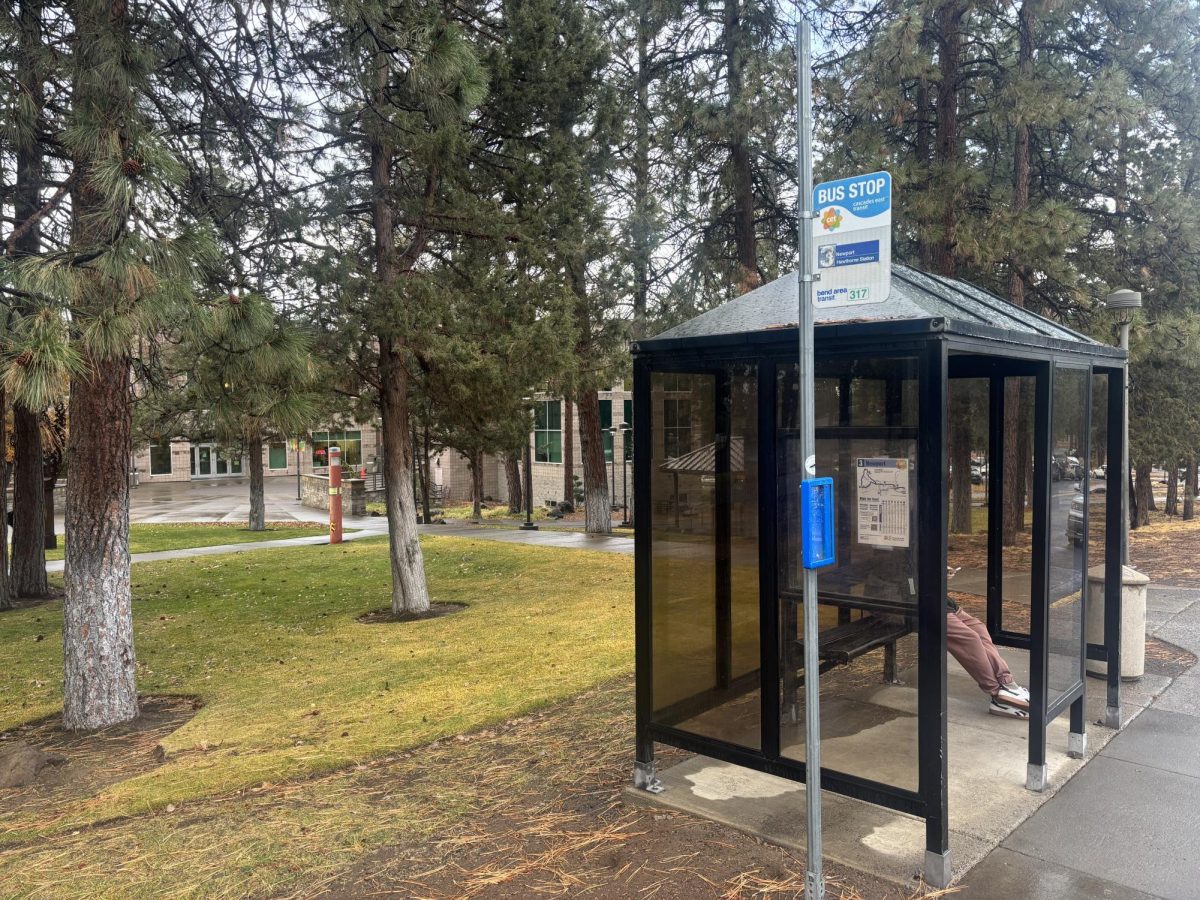 COCC bus stop in front of the Barber Library.