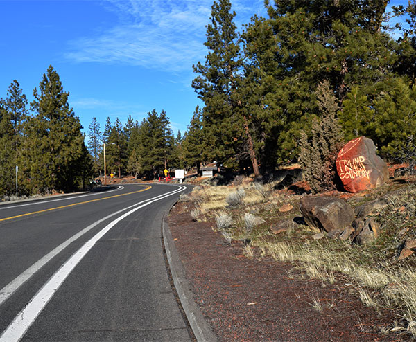 A large rock with an outlined heart with the words Trump Country beneath was near the COCC Bend Campus entrance on NW College Way. (photo above was shot on Jan. 9)