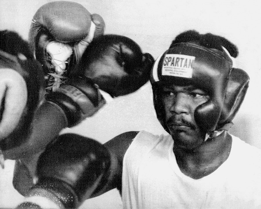 1974 sports photo of boxing legend George Foreman.  Public domain, photo courtesy of Wikimedia Commons.