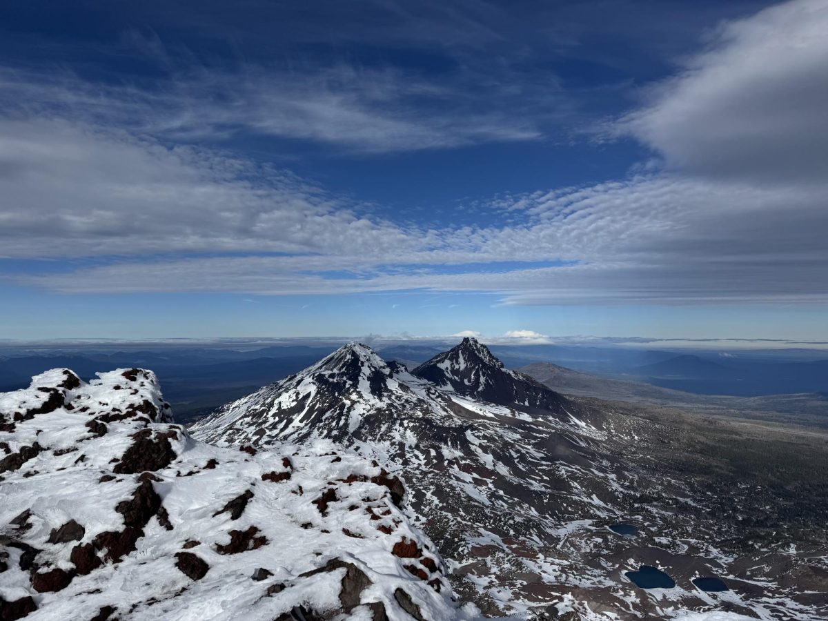 A few feet from the true summit, a great view of Middle and North Sister can be seen.