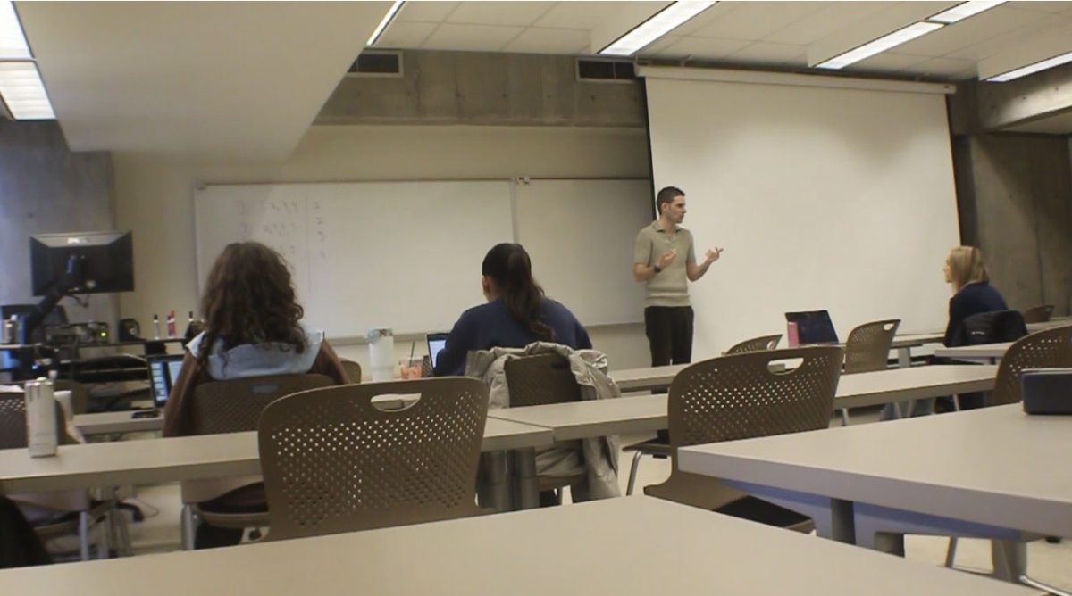 Professor Jared Miller teaching at Central Oregon Community College, now in his eighth year in the classroom and still showing up with curiosity, insight, and a reminder that learning never truly stops.